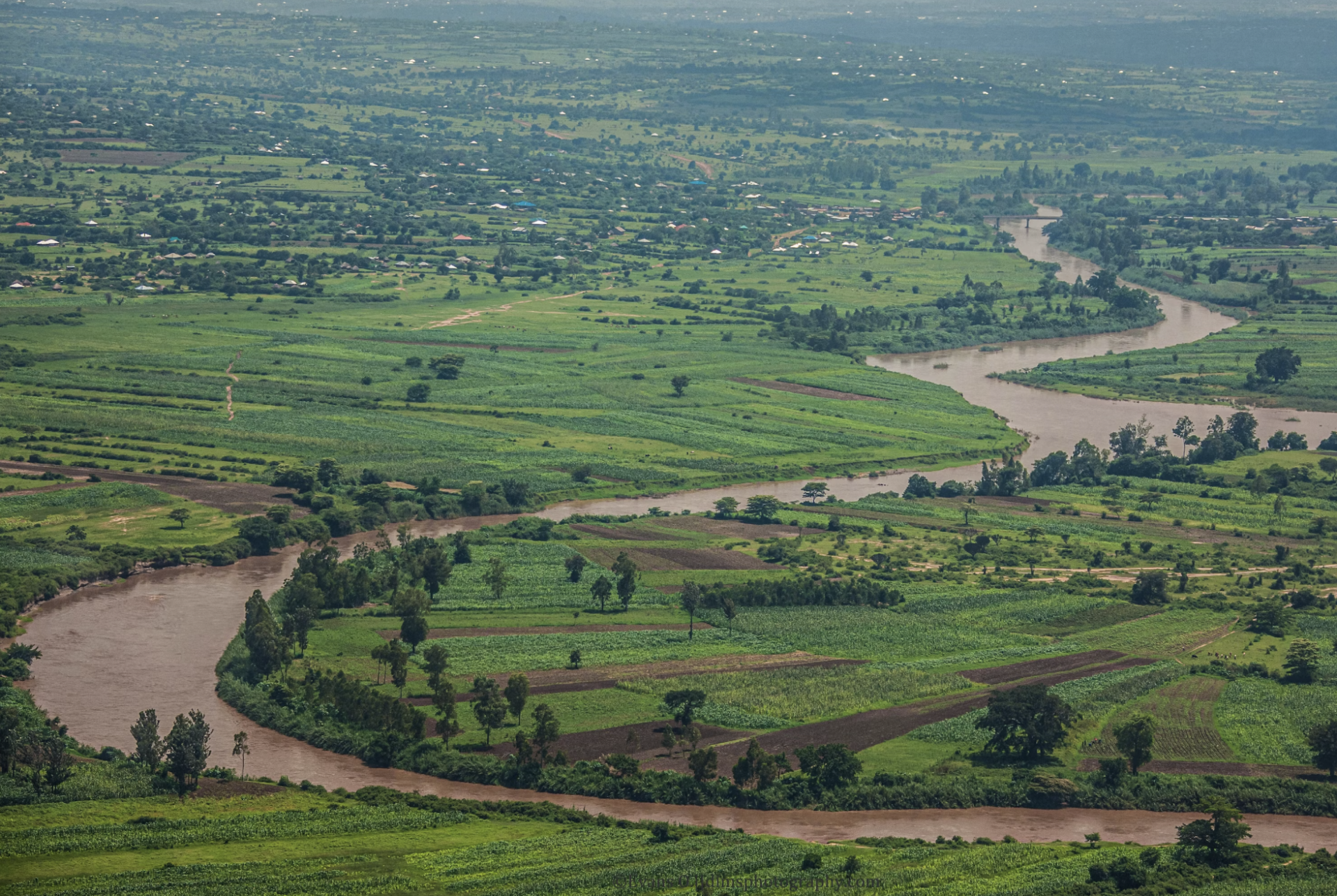 Design a business model for and launch a venture that makes low-cost machine tools for dredging silt and sand to rehabilitate rivers.